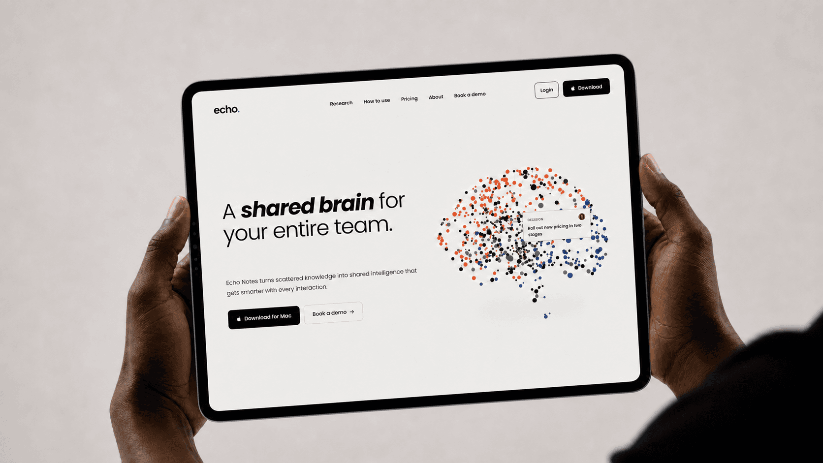 Echo website displayed on a slightly tilted landscape iPad held in two hands